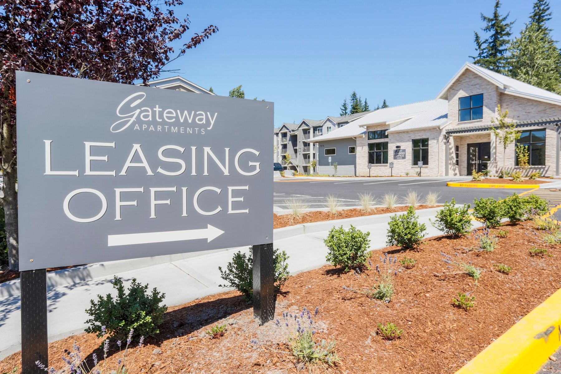 Gateway Apartments leasing office sign and clubhouse