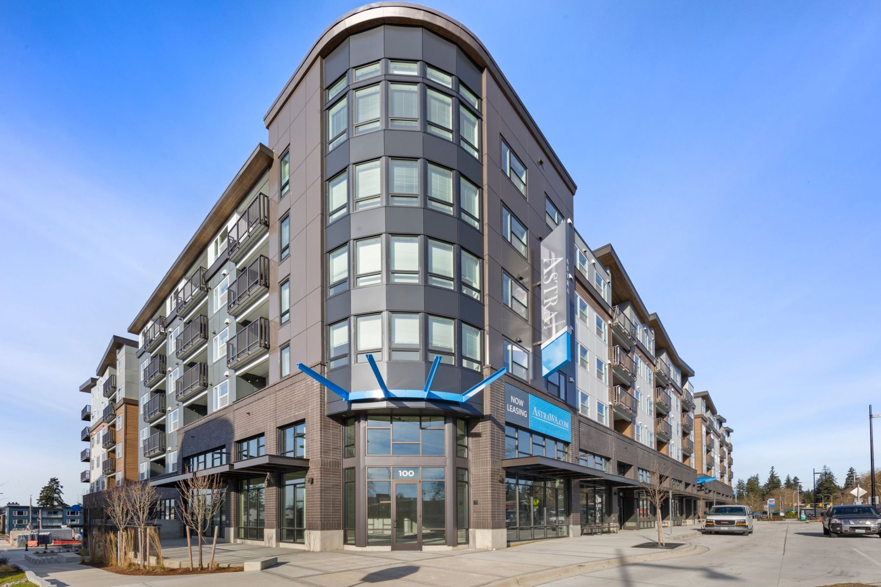 Astra, a six-story mixed-use apartment building in Renton, on a clear day