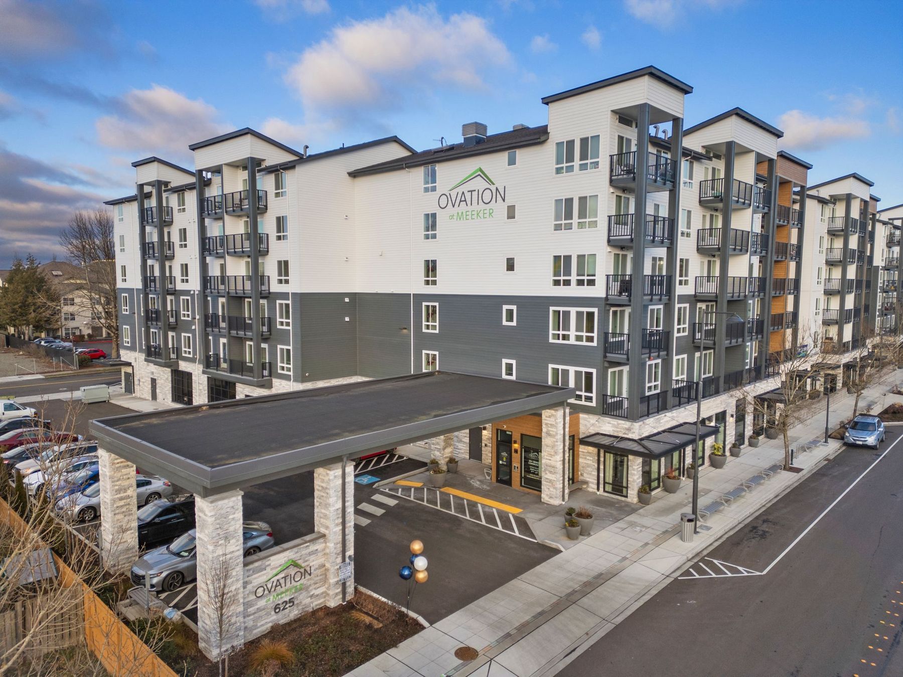 Aerial view of Ovation at Meeker, a six-story senior apartment building