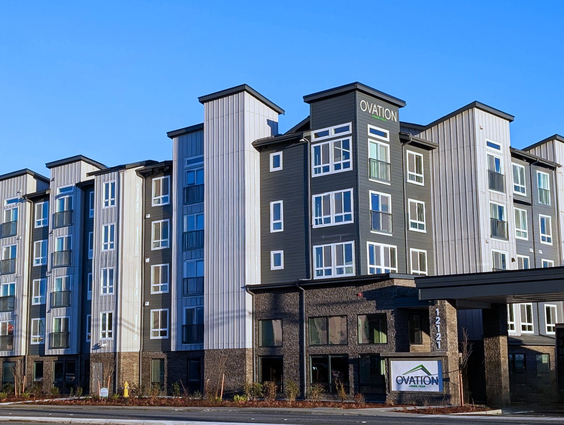 Ovation at Paine Field, a five-story senior apartment building with porte-cochère